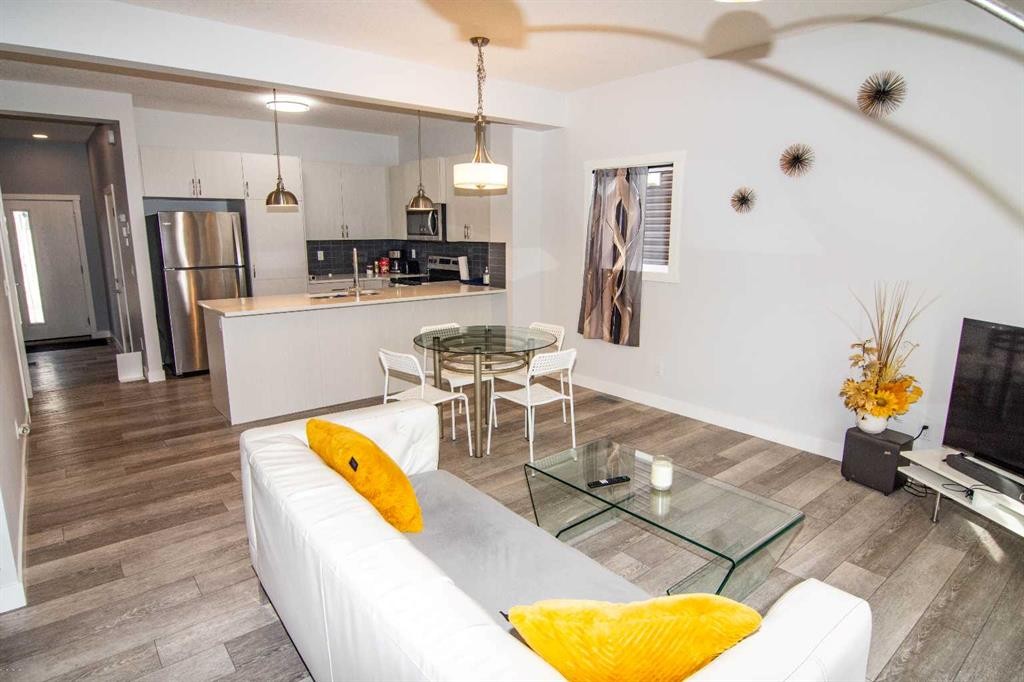 62 Walden Lane Se, Calgary, AB - Indoor Photo Showing Kitchen With Stainless Steel Kitchen