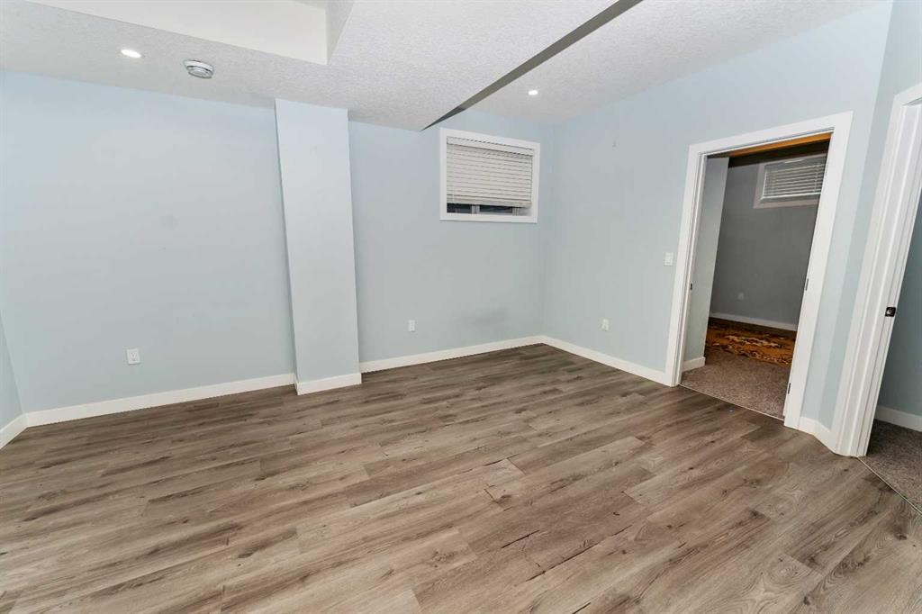 73 Redstone Link Ne, Calgary, AB - Indoor Photo Showing Other Room