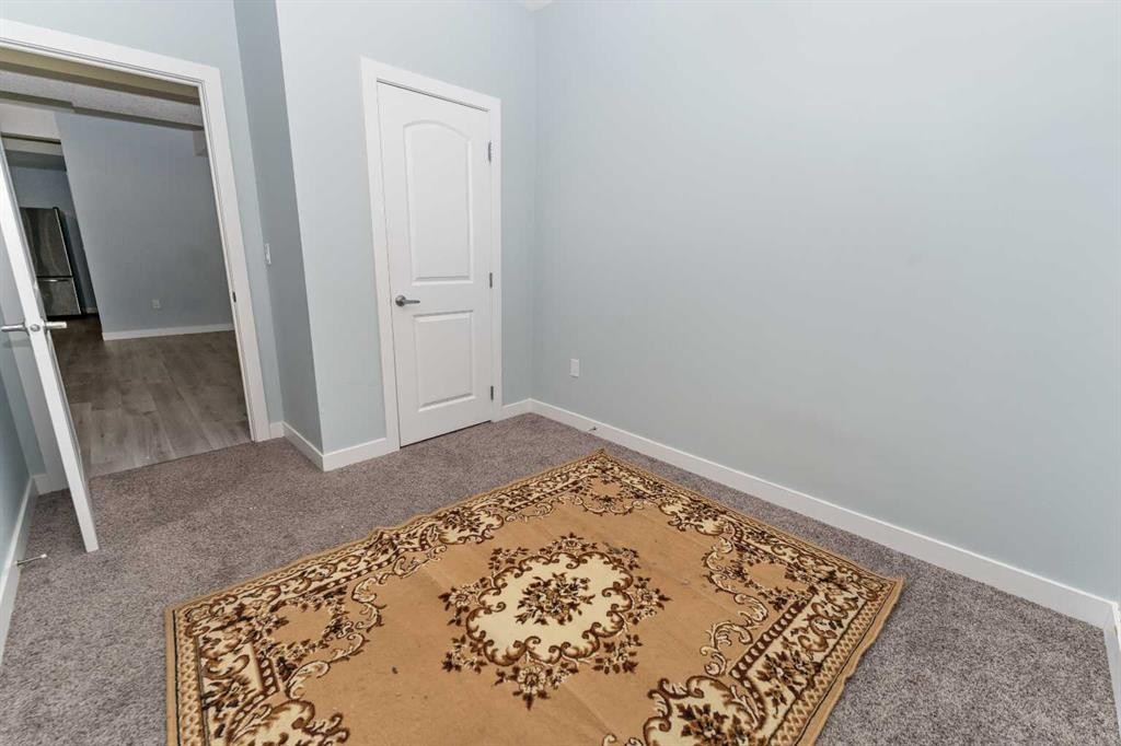 73 Redstone Link Ne, Calgary, AB - Indoor Photo Showing Other Room