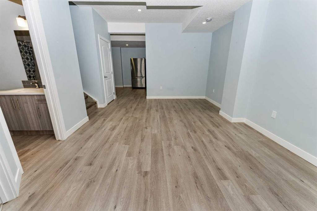 73 Redstone Link Ne, Calgary, AB - Indoor Photo Showing Other Room