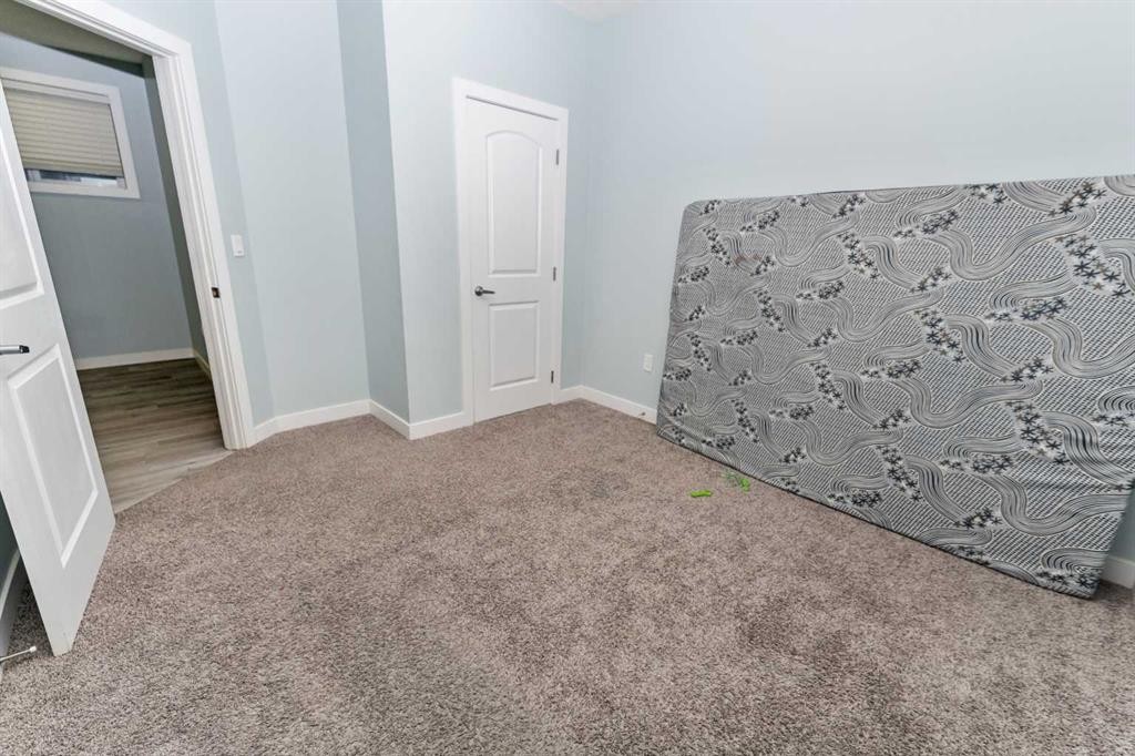 73 Redstone Link Ne, Calgary, AB - Indoor Photo Showing Other Room