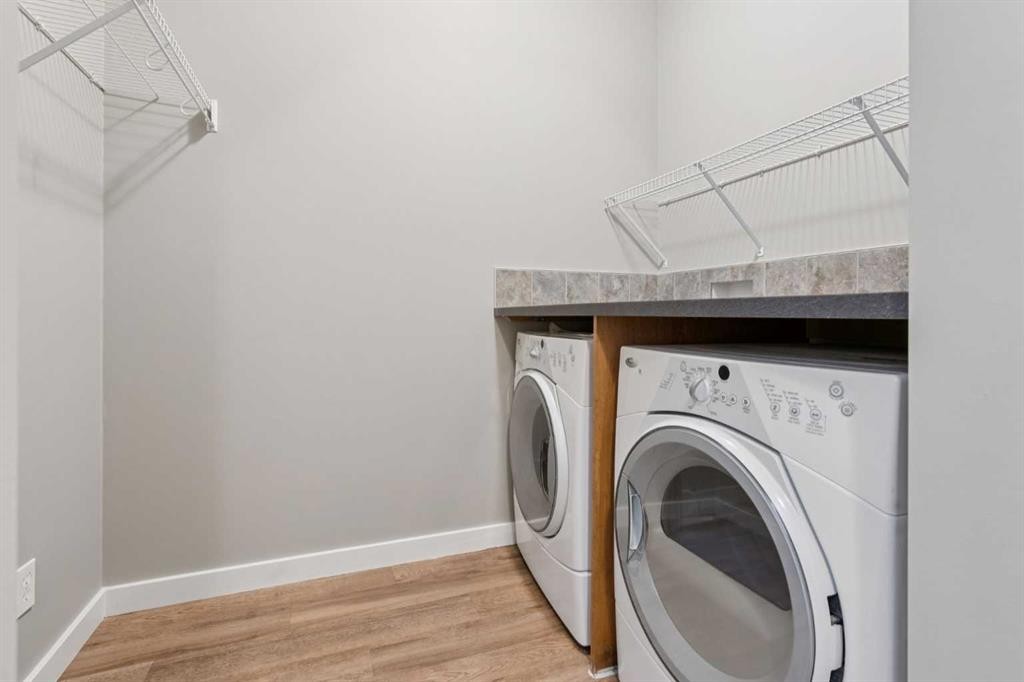 327 Panamount Point Nw, Calgary, AB - Indoor Photo Showing Laundry Room