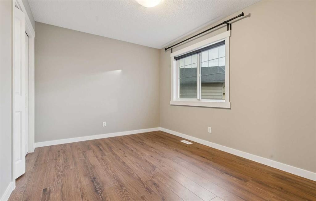 327 Panamount Point Nw, Calgary, AB - Indoor Photo Showing Other Room