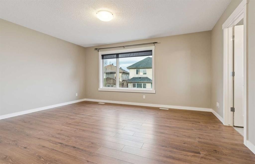 327 Panamount Point Nw, Calgary, AB - Indoor Photo Showing Other Room