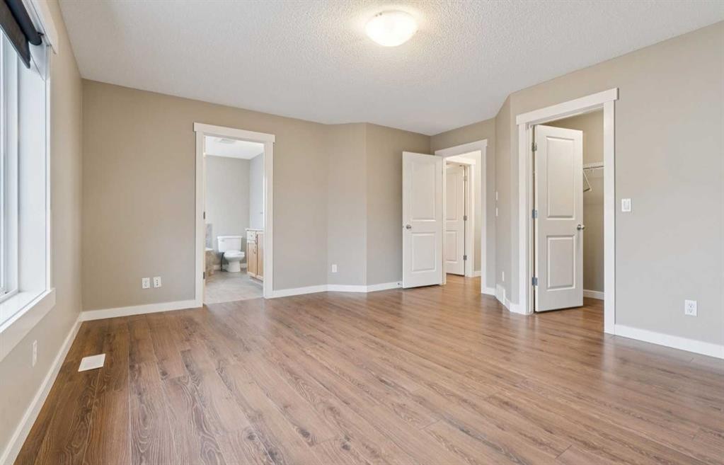 327 Panamount Point Nw, Calgary, AB - Indoor Photo Showing Other Room