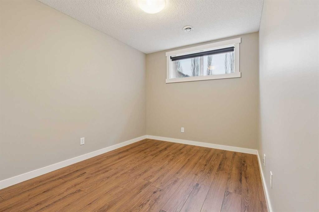 327 Panamount Point Nw, Calgary, AB - Indoor Photo Showing Other Room