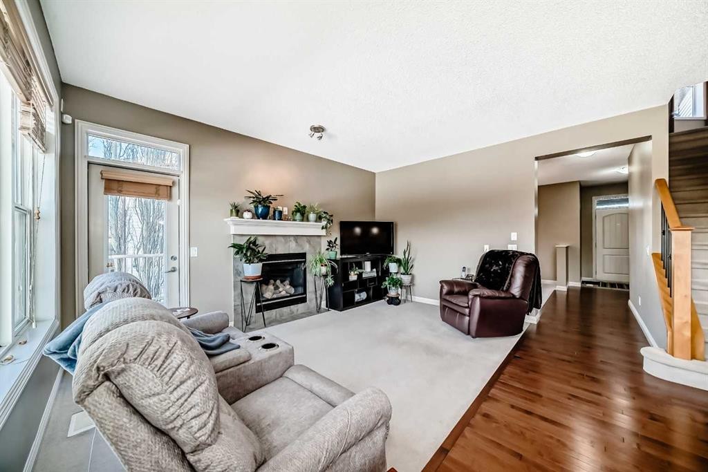 172 Seagreen Way, Chestermere, AB - Indoor Photo Showing Other Room With Fireplace