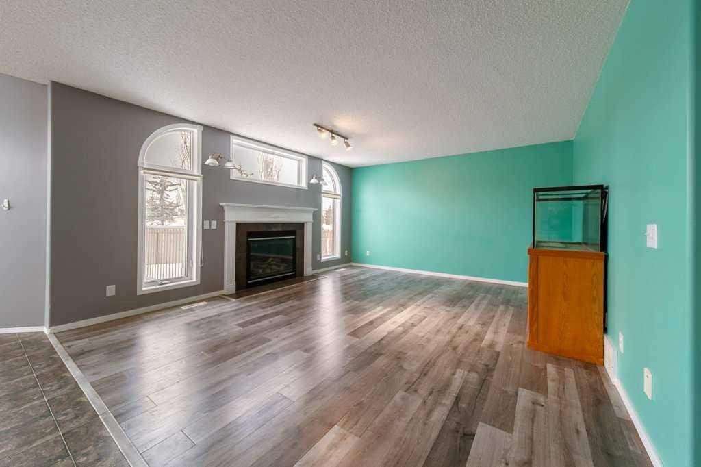 6 Lansing Close, Spruce Grove, AB - Indoor Photo Showing Living Room With Fireplace