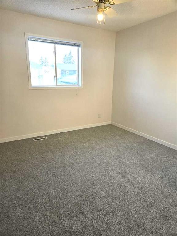 182 Coventry Close Ne, Calgary, AB - Indoor Photo Showing Other Room