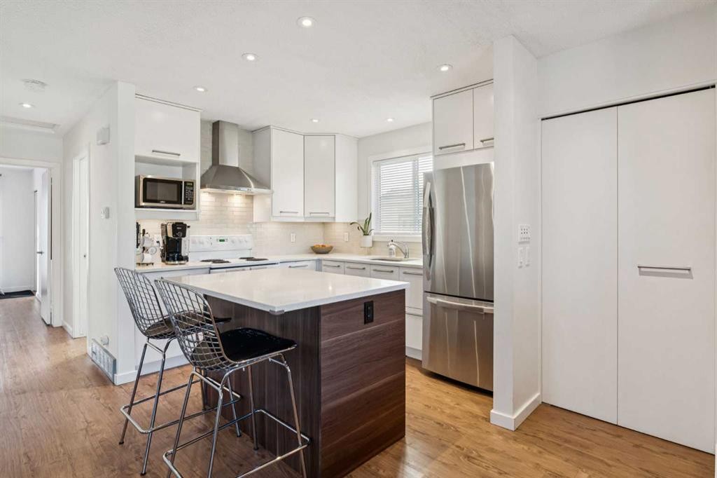 65 Tararidge Close Ne, Calgary, AB - Indoor Photo Showing Kitchen With Upgraded Kitchen