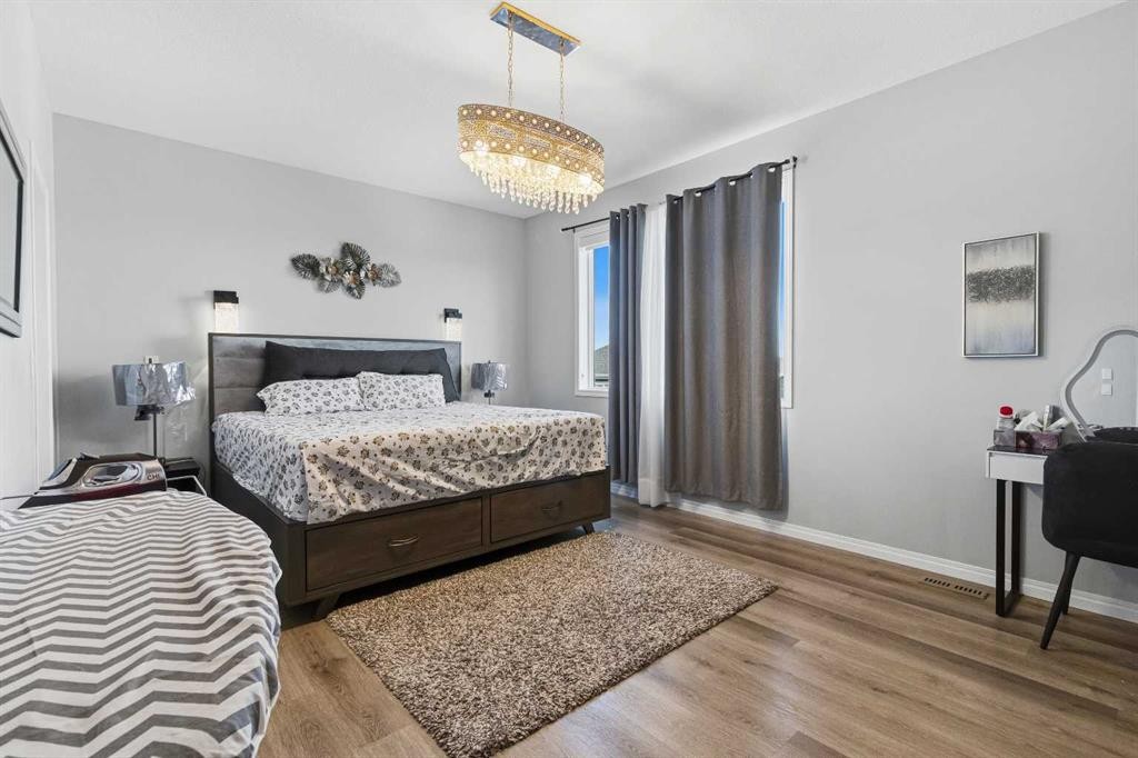 237 Windrow Crescent Sw, Airdrie, AB - Indoor Photo Showing Bedroom