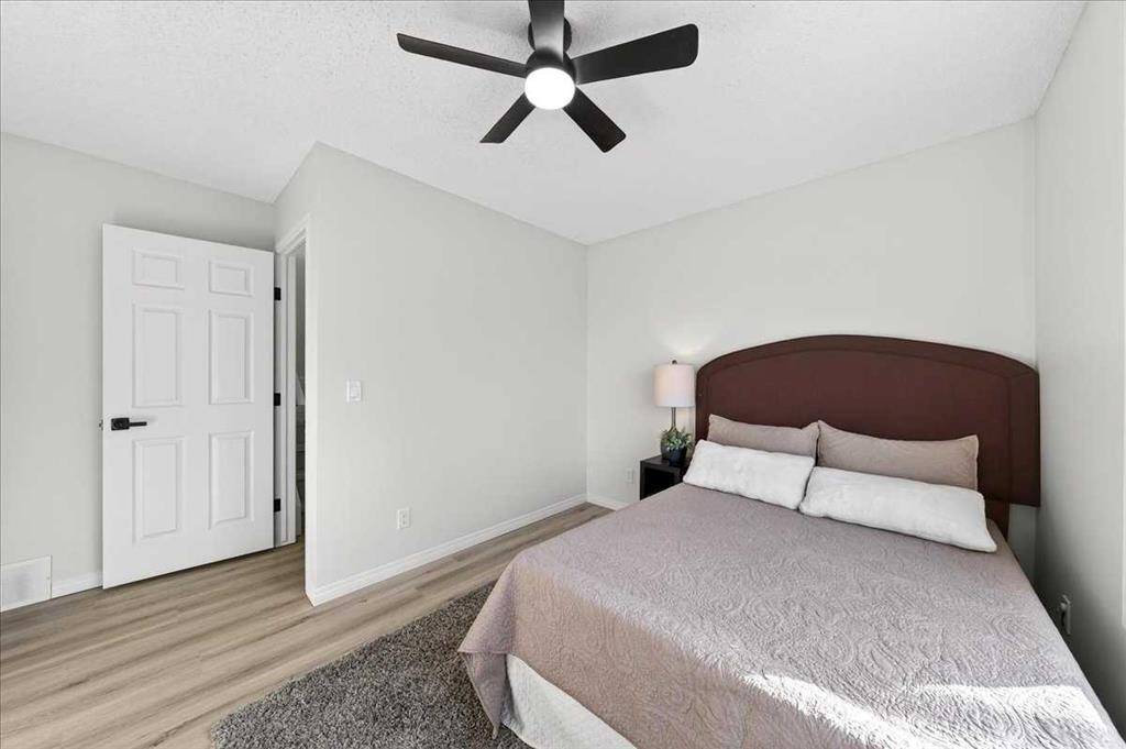 11 Copperfield Court Se, Calgary, AB - Indoor Photo Showing Bedroom