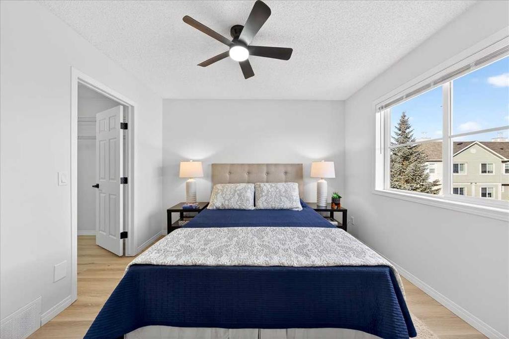 11 Copperfield Court Se, Calgary, AB - Indoor Photo Showing Bedroom