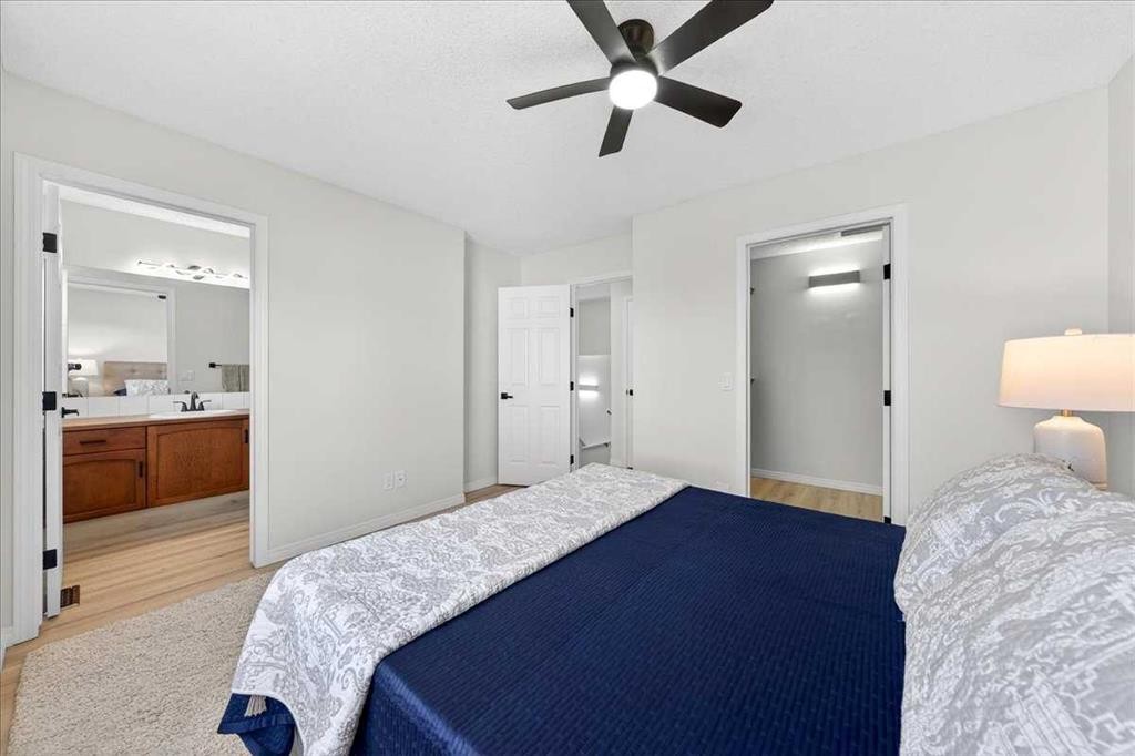 11 Copperfield Court Se, Calgary, AB - Indoor Photo Showing Bedroom