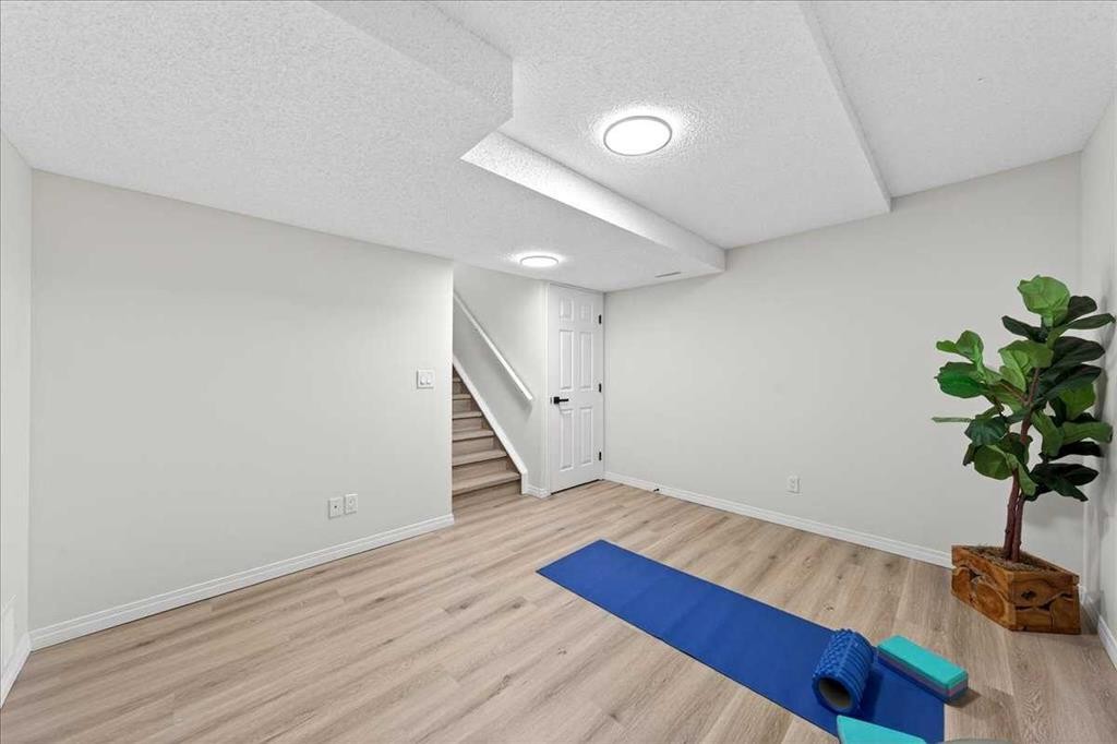 11 Copperfield Court Se, Calgary, AB - Indoor Photo Showing Other Room