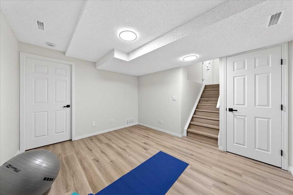 11 Copperfield Court Se, Calgary, AB - Indoor Photo Showing Other Room