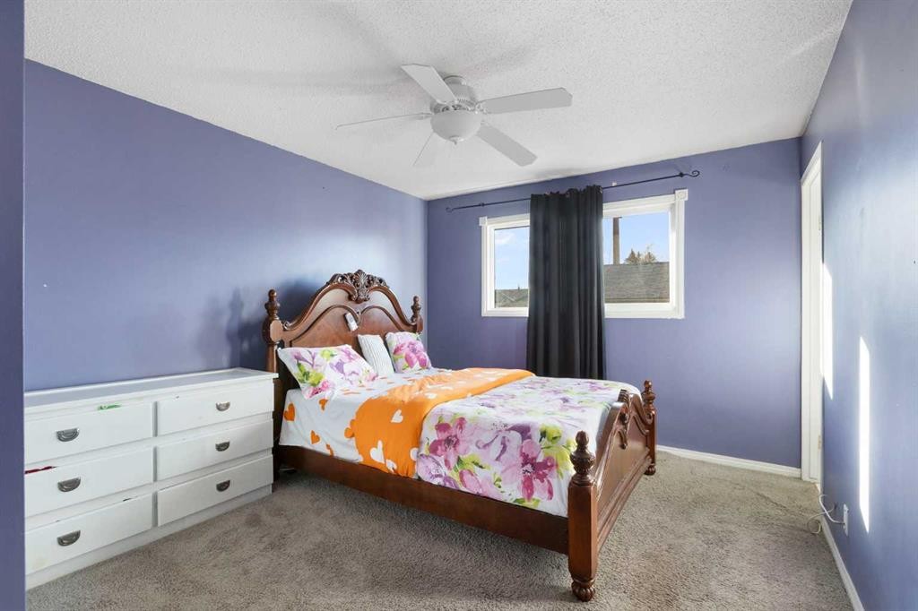 6124 Maddock Drive Ne, Calgary, AB - Indoor Photo Showing Bedroom