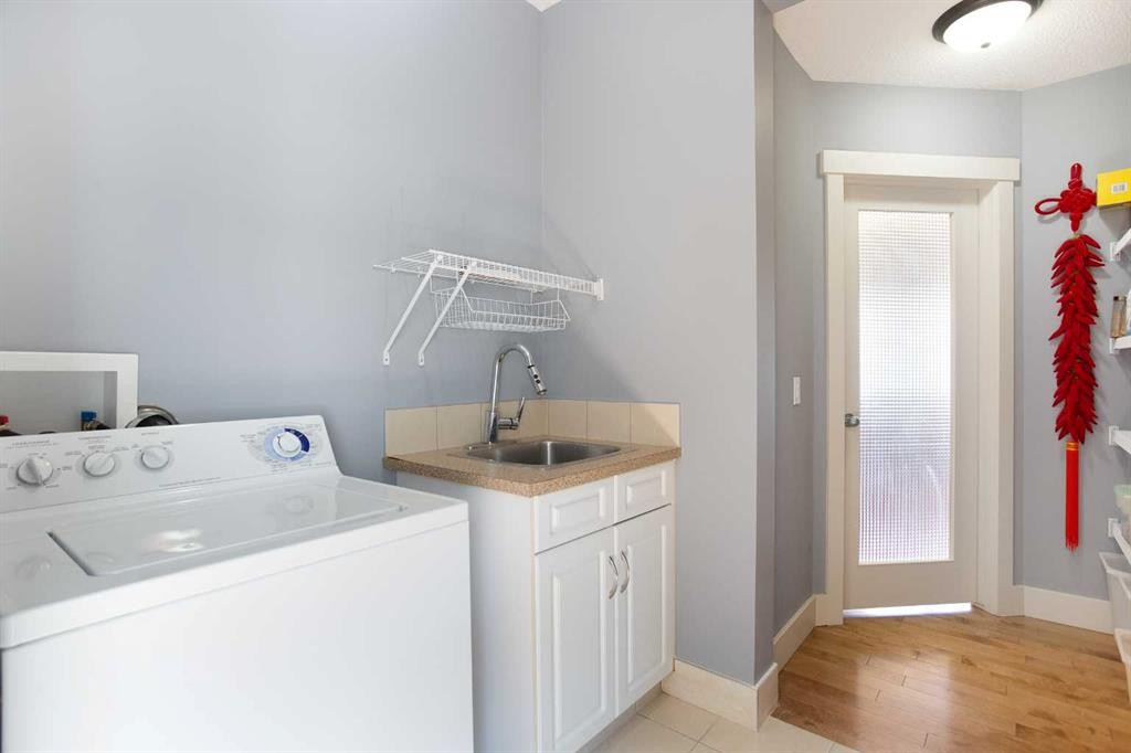 62 Panamount Road Nw, Calgary, AB - Indoor Photo Showing Laundry Room