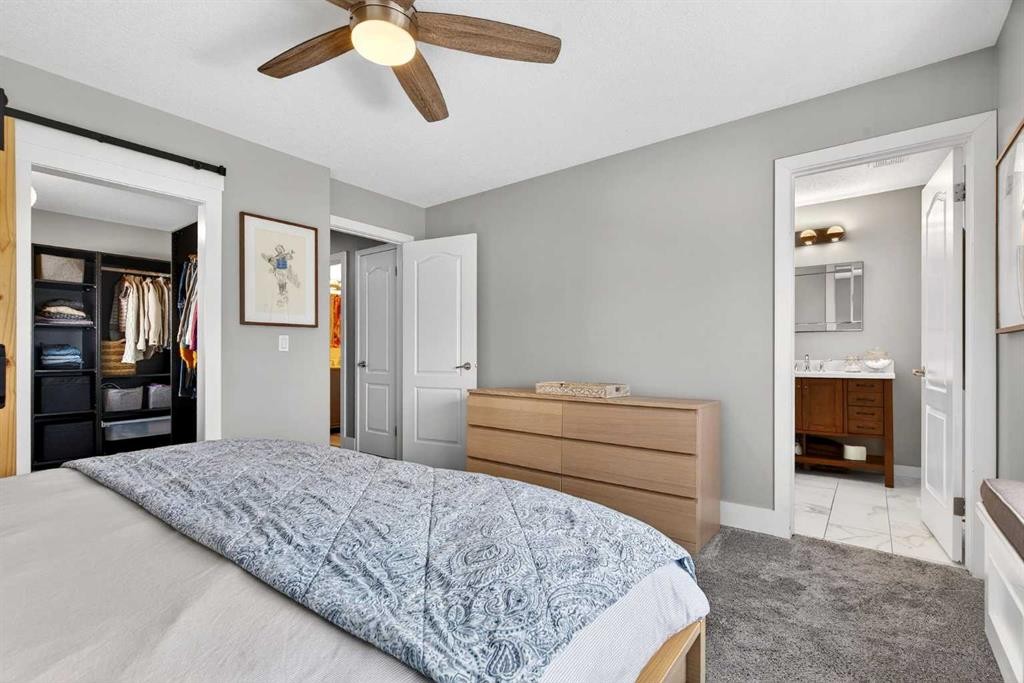 951 3Rd Street Sw, Diamond Valley, AB - Indoor Photo Showing Bedroom