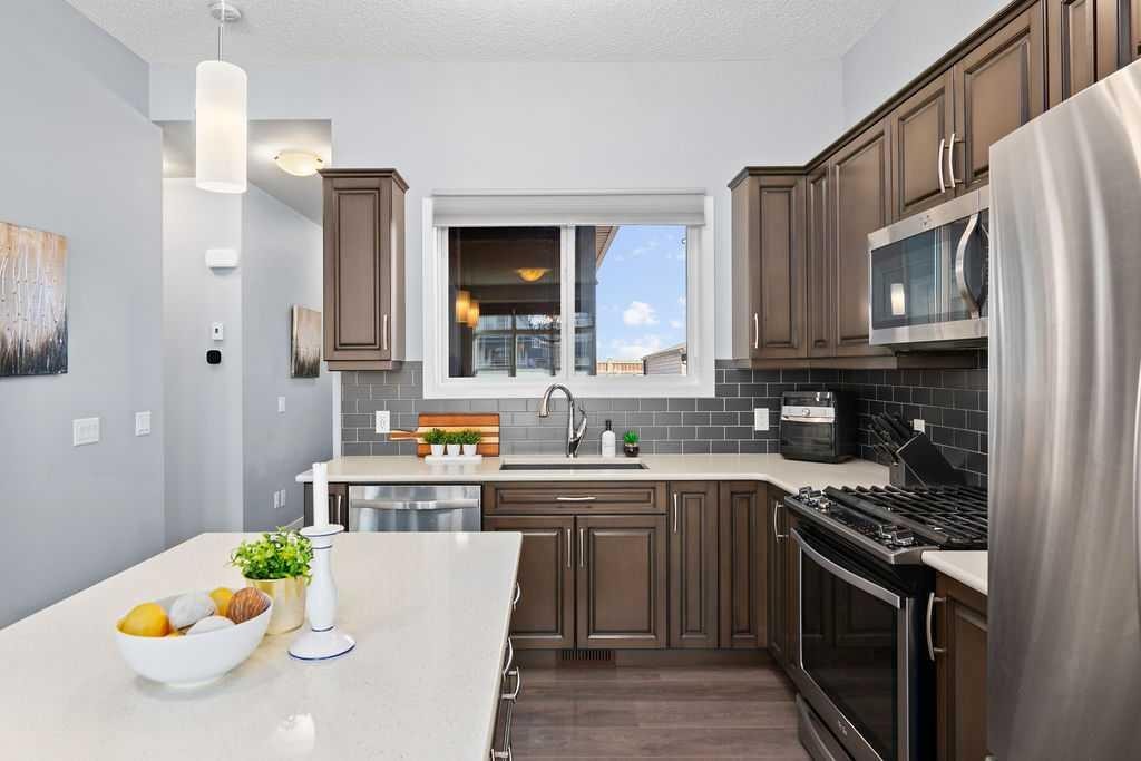 103 Masters Heights Se, Calgary, AB - Indoor Photo Showing Kitchen With Upgraded Kitchen