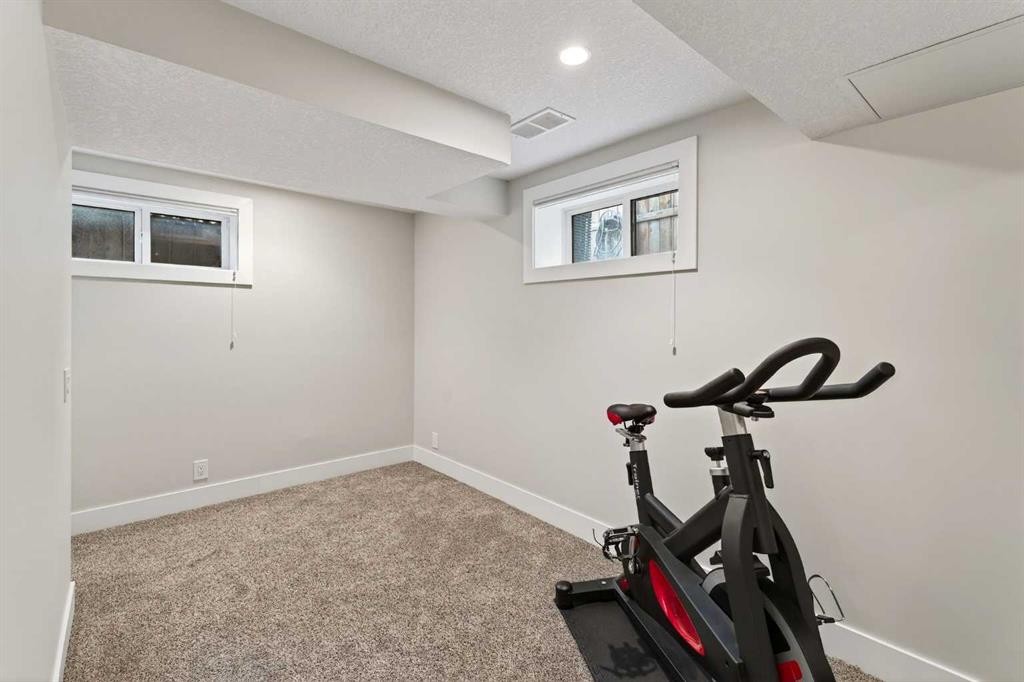 7 Westminster Place Sw, Calgary, AB - Indoor Photo Showing Gym Room