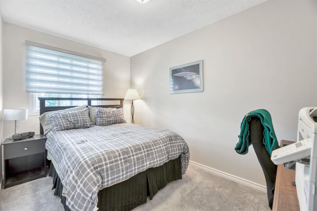 5 Falsby Place Ne, Calgary, AB - Indoor Photo Showing Bedroom