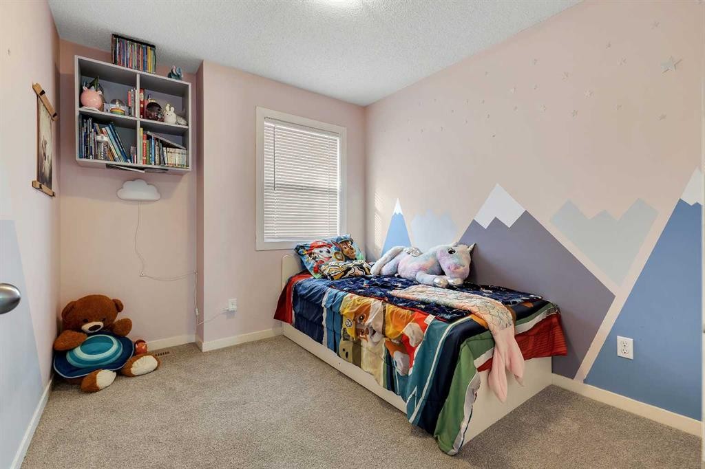 149 New Brighton Point Se, Calgary, AB - Indoor Photo Showing Bedroom