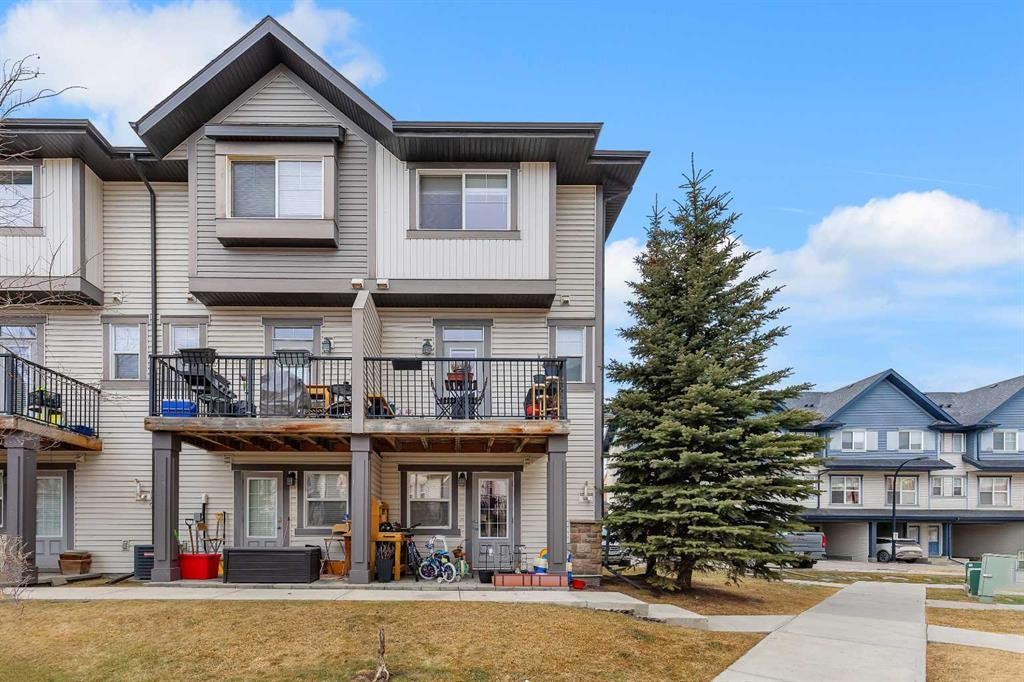 149 New Brighton Point Se, Calgary, AB - Outdoor With Balcony With Facade