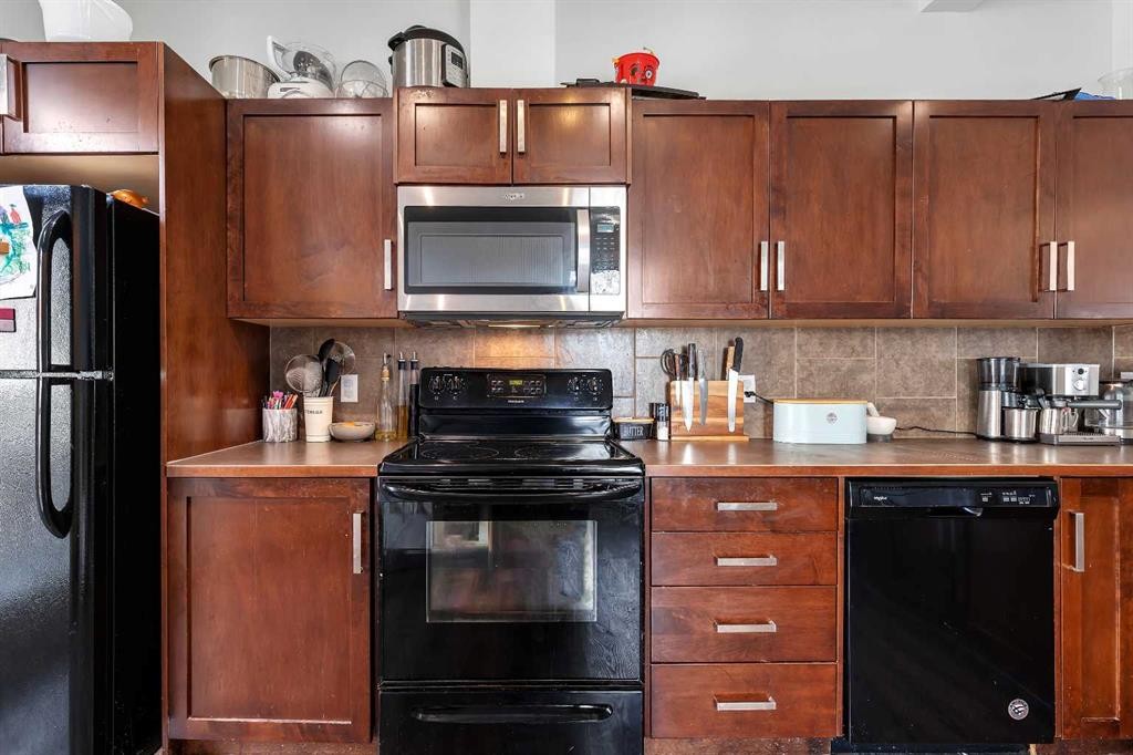 149 New Brighton Point Se, Calgary, AB - Indoor Photo Showing Kitchen