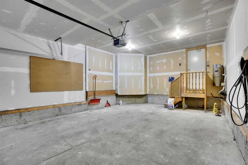 157 Riverview Park, Calgary, AB - Indoor Photo Showing Garage