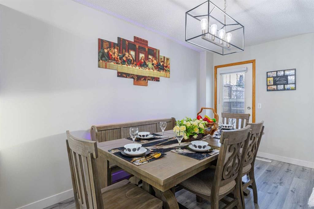 13 Mt. Aberdeen Manor Se, Calgary, AB - Indoor Photo Showing Dining Room
