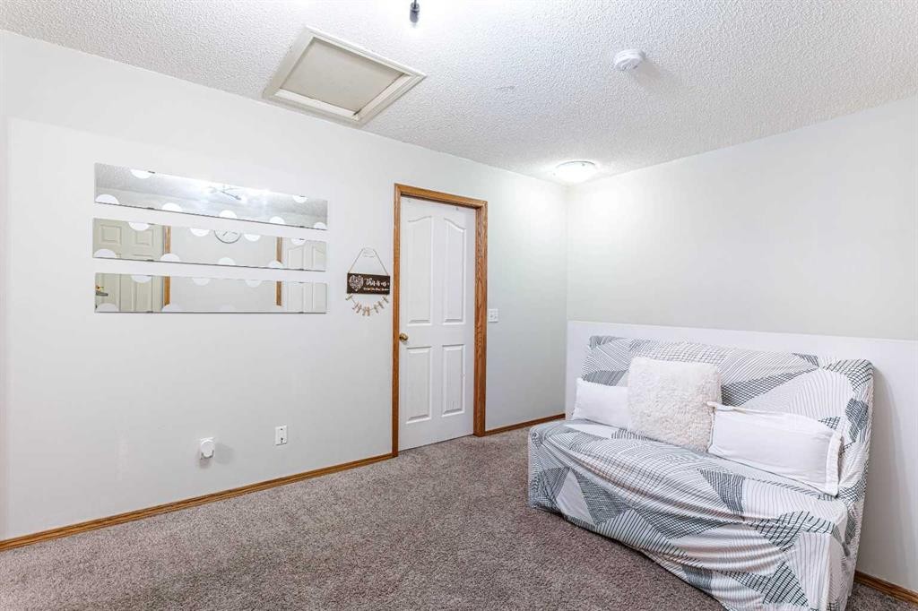13 Mt. Aberdeen Manor Se, Calgary, AB - Indoor Photo Showing Other Room
