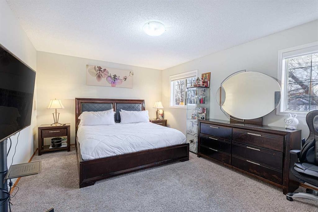 13 Mt. Aberdeen Manor Se, Calgary, AB - Indoor Photo Showing Bedroom