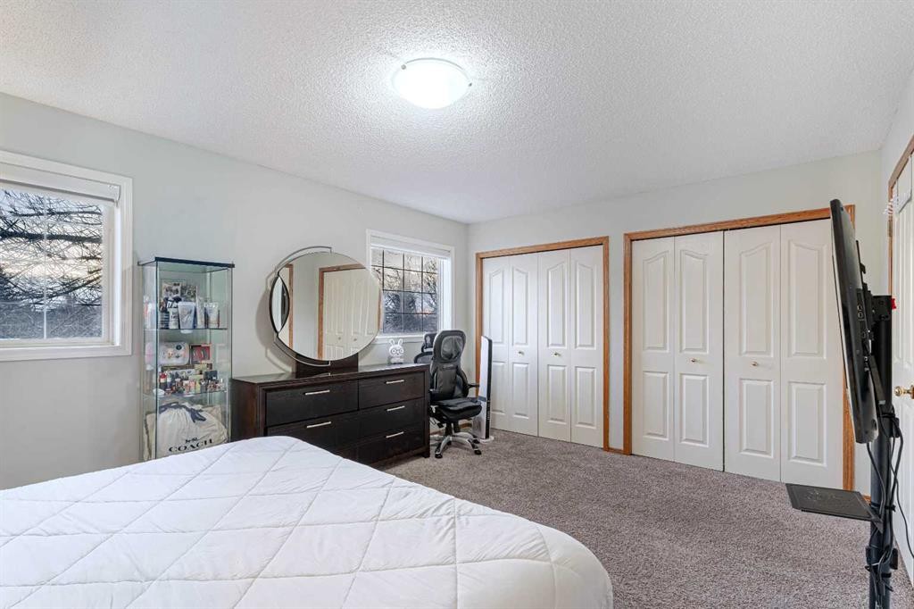 13 Mt. Aberdeen Manor Se, Calgary, AB - Indoor Photo Showing Bedroom