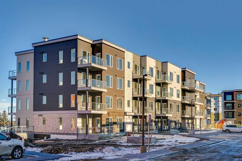 408-660 Shawnee Square Sw, Calgary, AB - Outdoor With Balcony With Facade