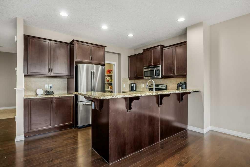 103 Panamount Common Nw, Calgary, AB - Indoor Photo Showing Kitchen With Stainless Steel Kitchen With Upgraded Kitchen