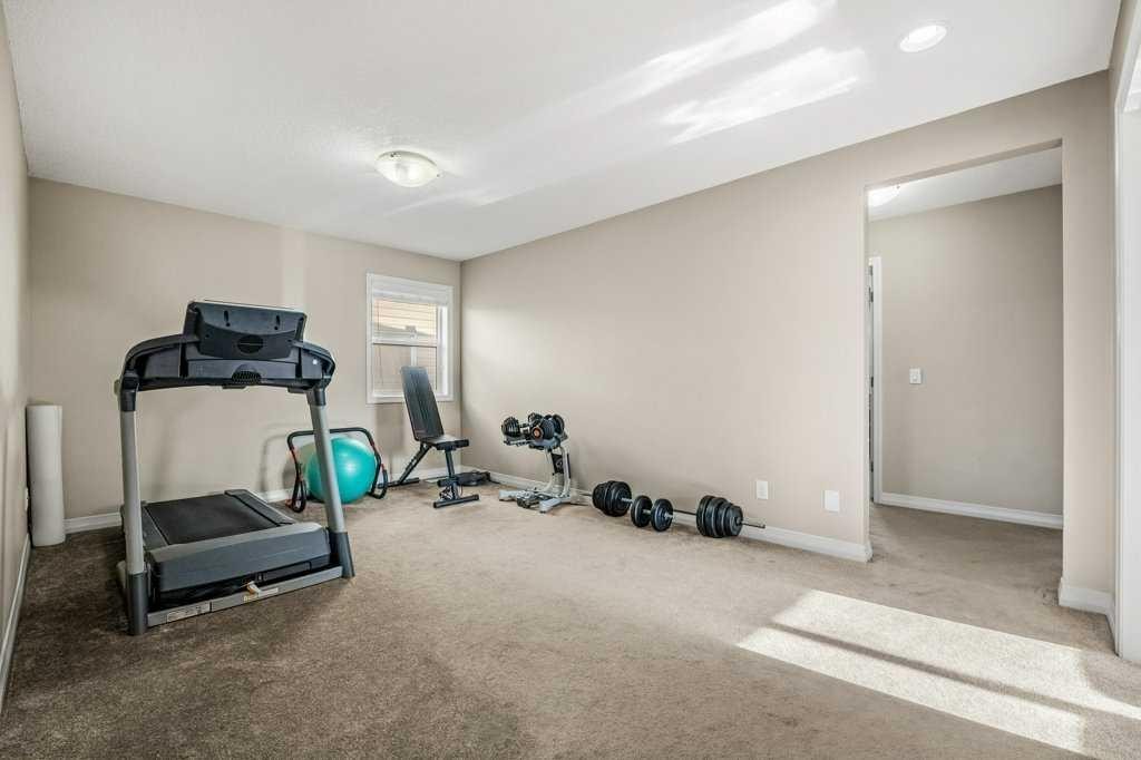 103 Panamount Common Nw, Calgary, AB - Indoor Photo Showing Gym Room
