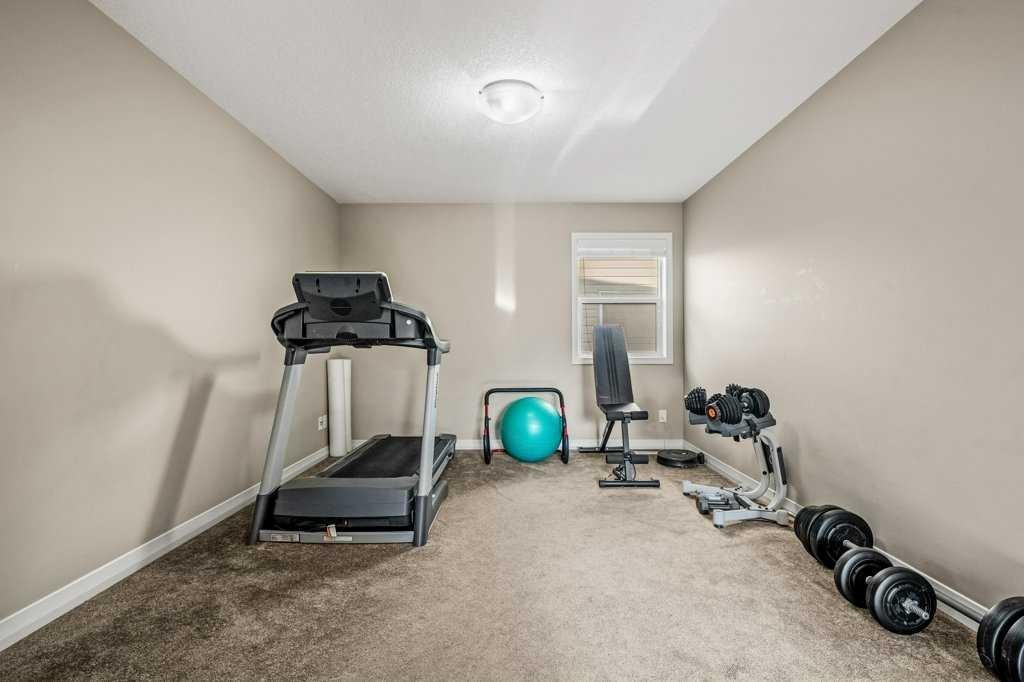 103 Panamount Common Nw, Calgary, AB - Indoor Photo Showing Gym Room