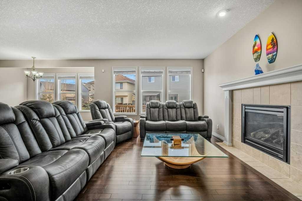 103 Panamount Common Nw, Calgary, AB - Indoor Photo Showing Living Room With Fireplace