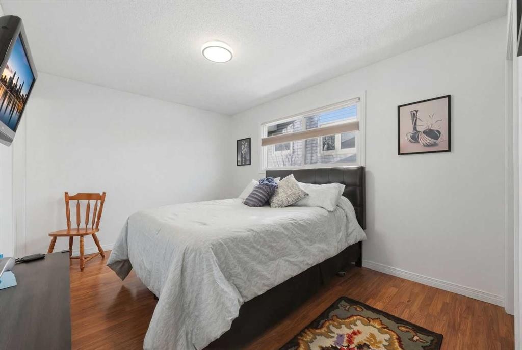 63 Huntmeadow Road Ne, Calgary, AB - Indoor Photo Showing Bedroom
