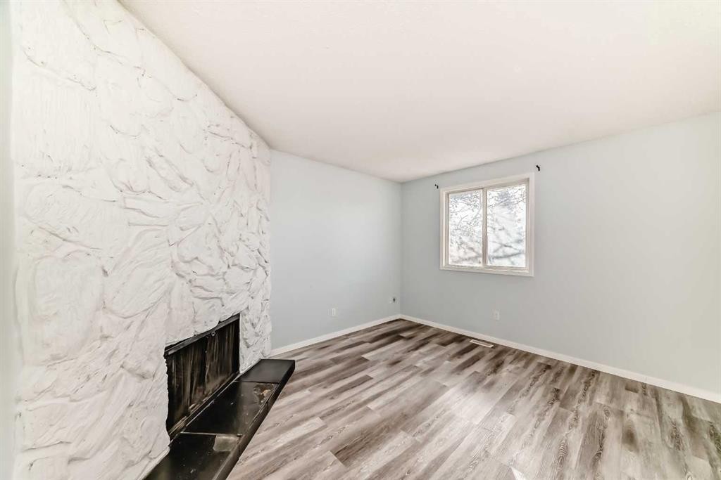 151F Pinehill Road Ne, Calgary, AB - Indoor Photo Showing Other Room With Fireplace