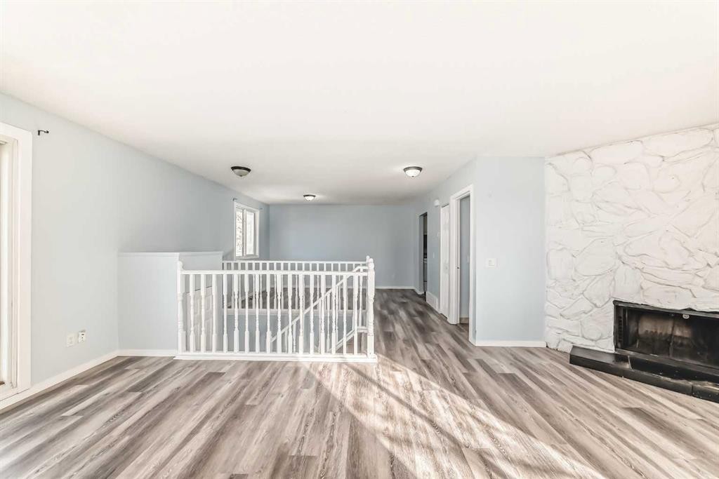151F Pinehill Road Ne, Calgary, AB - Indoor With Fireplace