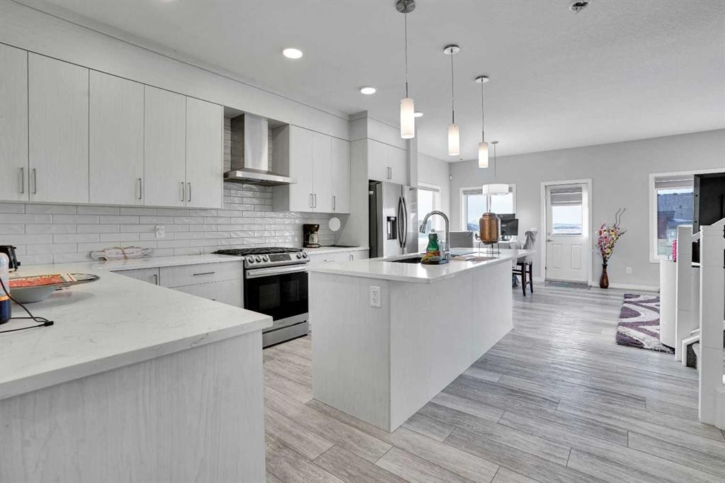 210 Lucas Close Nw, Calgary, AB - Indoor Photo Showing Kitchen With Stainless Steel Kitchen With Upgraded Kitchen