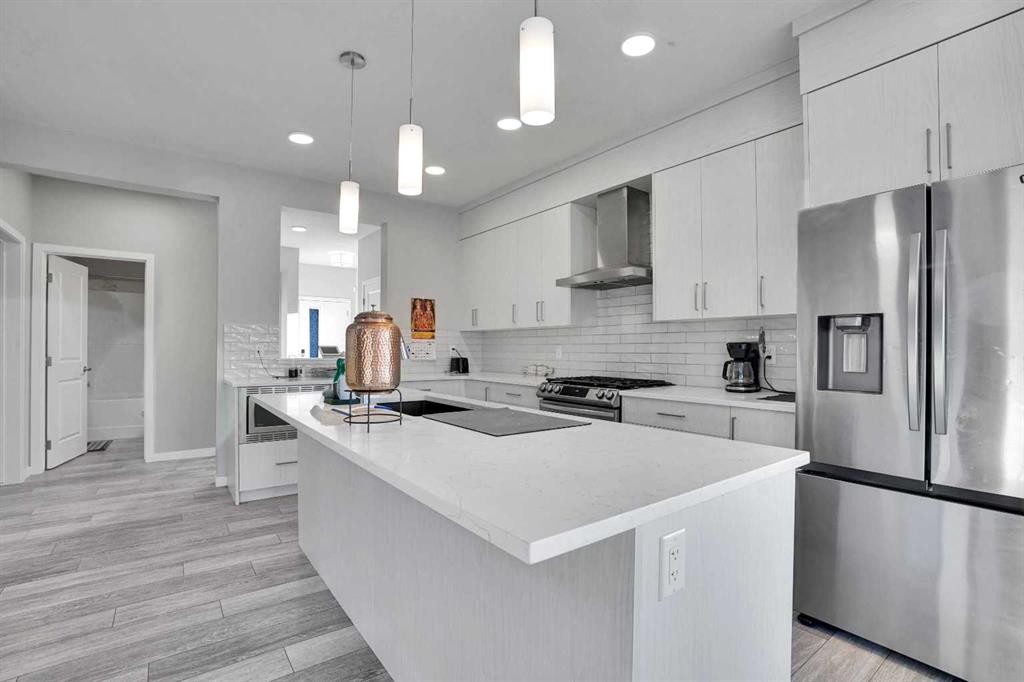 210 Lucas Close Nw, Calgary, AB - Indoor Photo Showing Kitchen With Stainless Steel Kitchen With Upgraded Kitchen