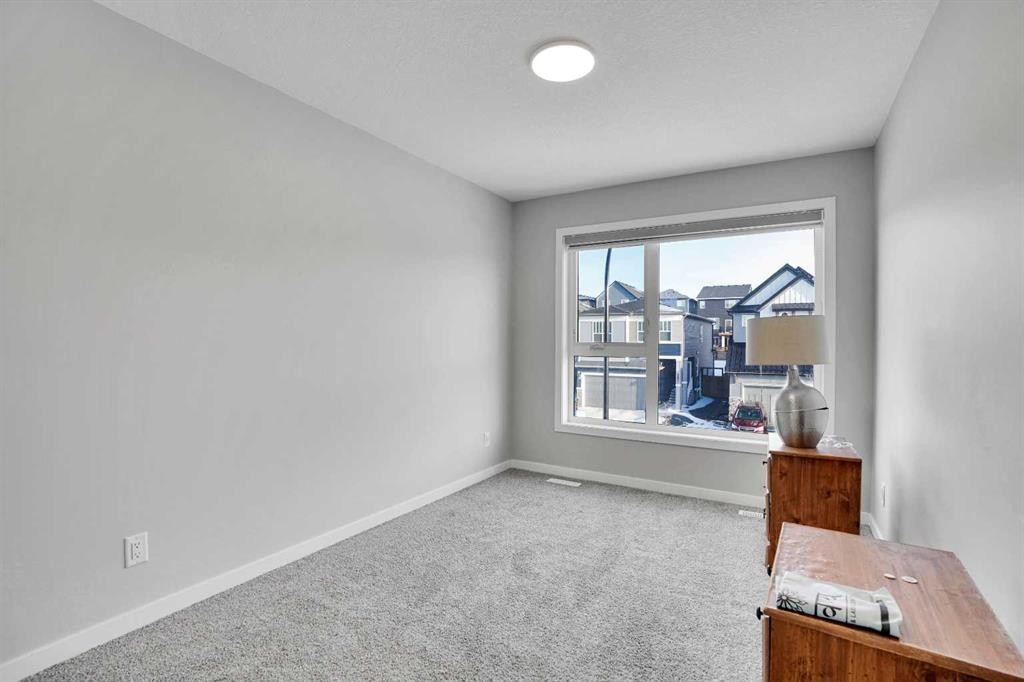 210 Lucas Close Nw, Calgary, AB - Indoor Photo Showing Other Room