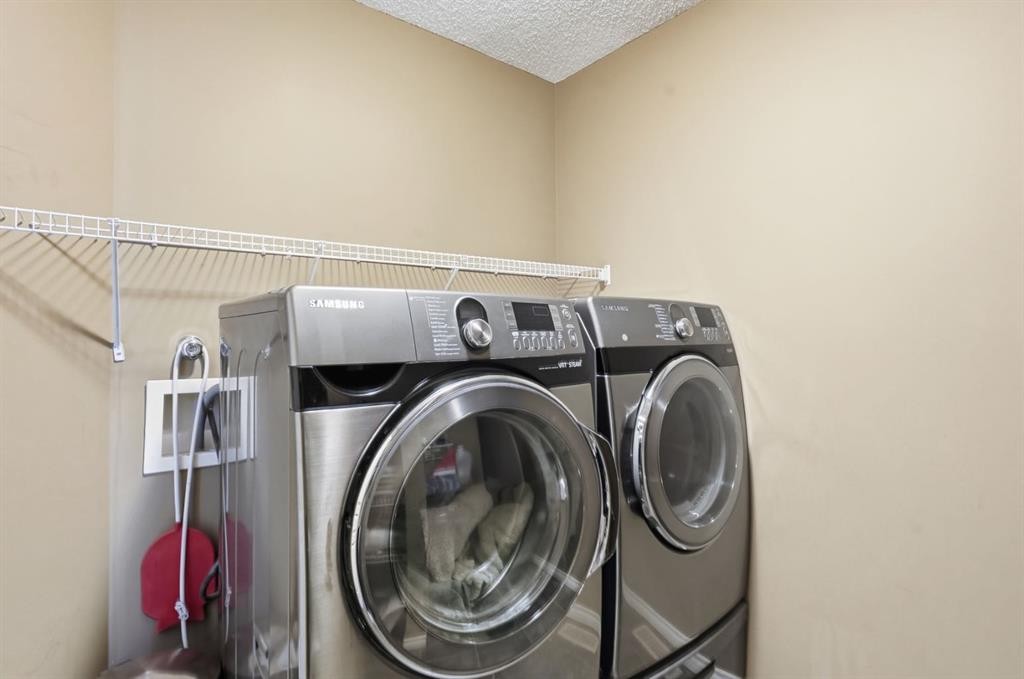 166 Cranridge Terrace Se, Calgary, AB - Indoor Photo Showing Laundry Room