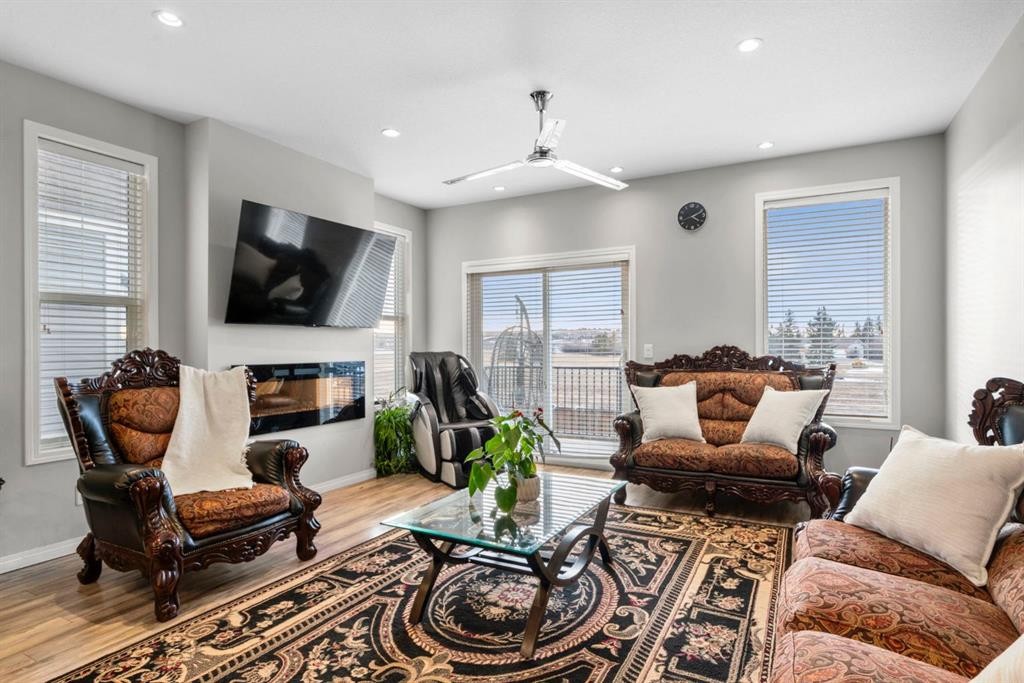 2001-280 Williamstown Close Nw, Airdrie, AB - Indoor Photo Showing Living Room With Fireplace