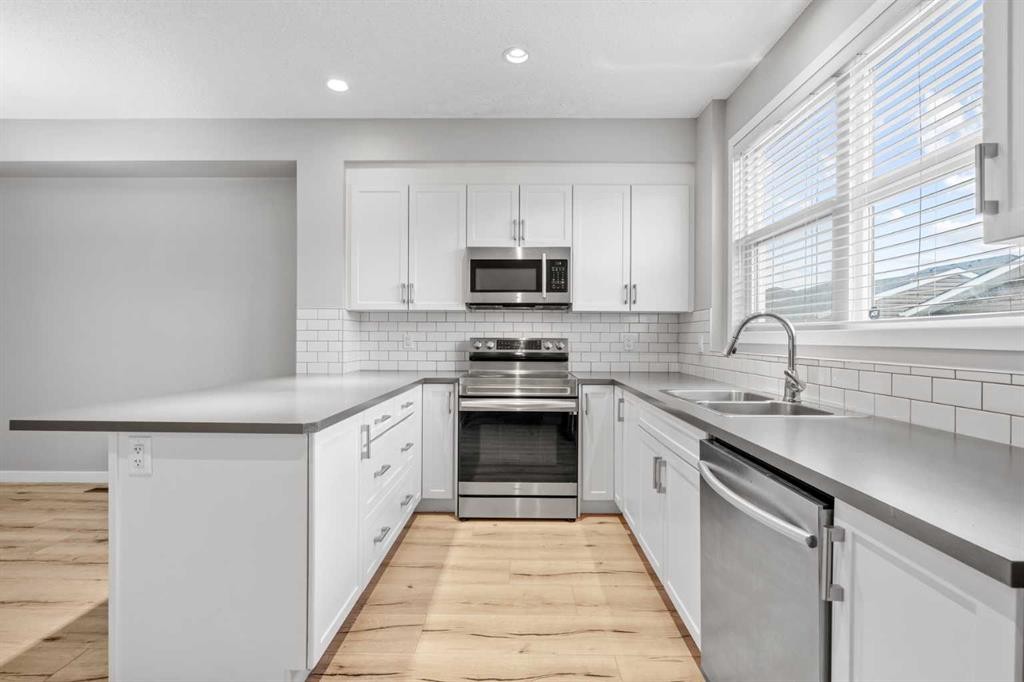 368 Redstone Drive Ne, Calgary, AB - Indoor Photo Showing Kitchen With Double Sink With Upgraded Kitchen