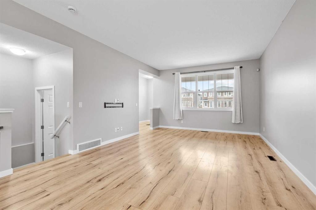 368 Redstone Drive Ne, Calgary, AB - Indoor Photo Showing Other Room With Fireplace