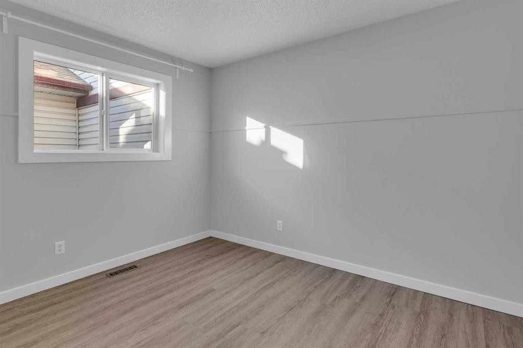 103 Canoe Square Sw, Airdrie, AB - Indoor Photo Showing Other Room